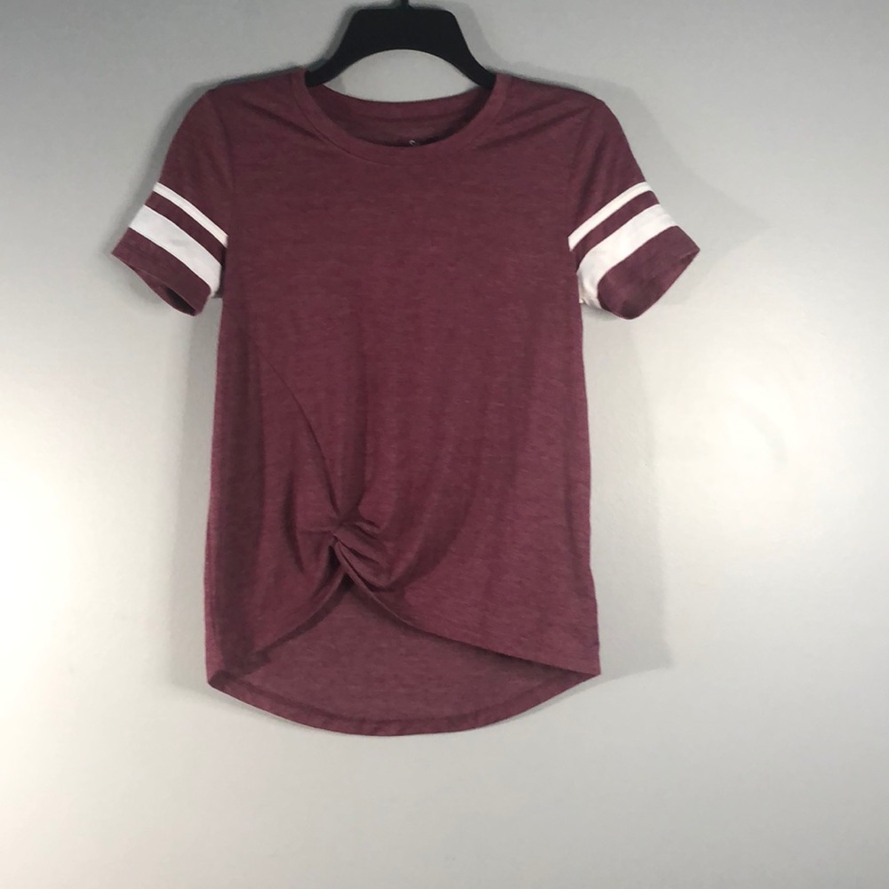 A maroon sporty tee